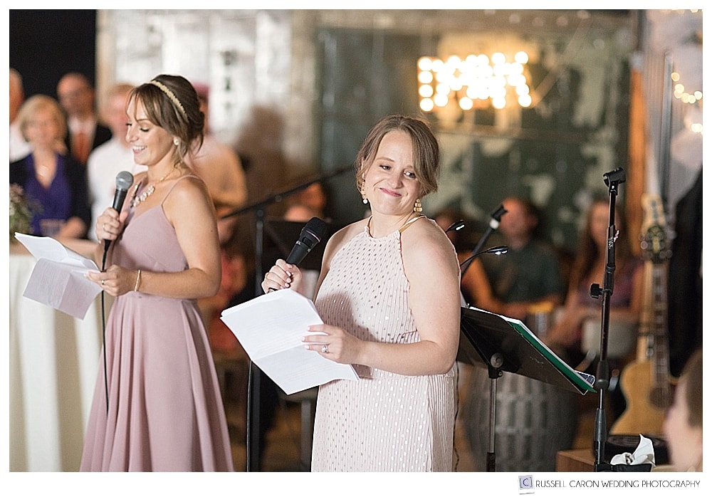 co-bridesmaids during toast at industrial chic Maine wedding reception. O'Maine Studios Portland Maine wedding photography