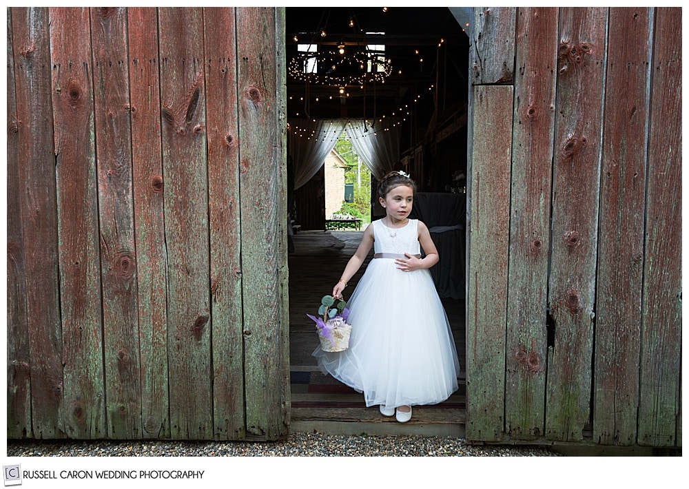 flower girl preparing to walk down the aisle