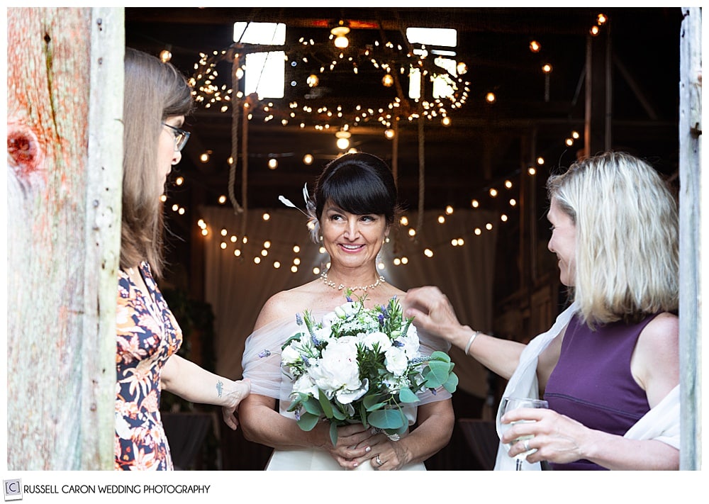 emotional bride with friends