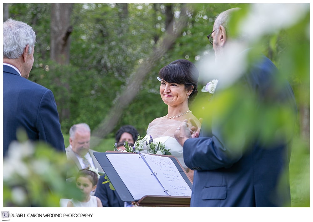 photo of the bride during an outdoor wedding ceremony