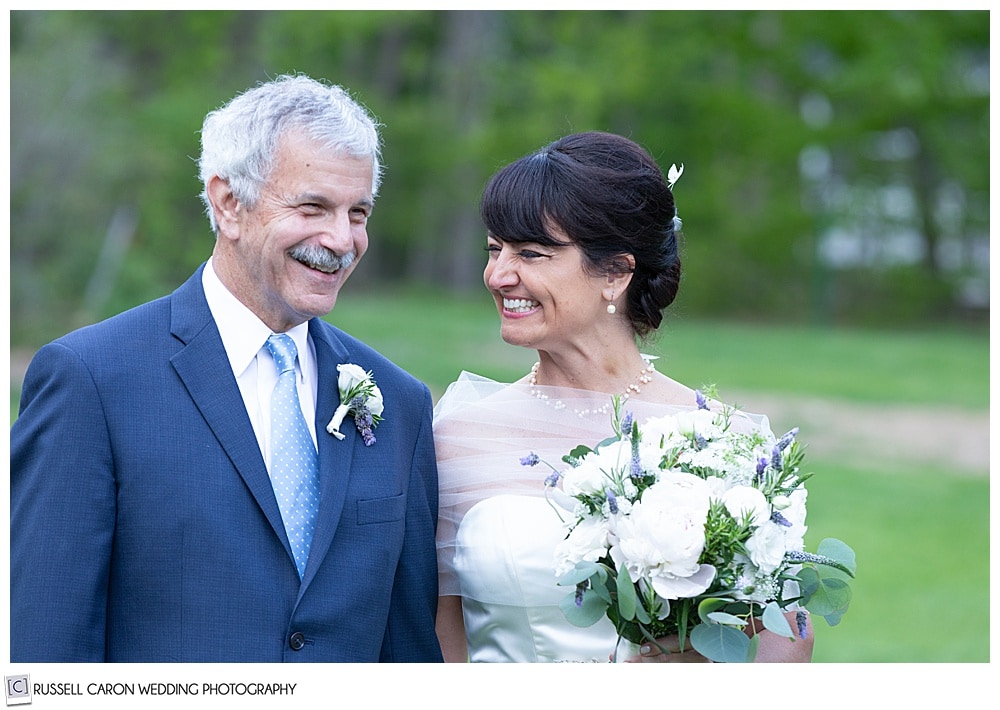 bride smiling at the groom during their intimate Cape Neddick wedding ceremony