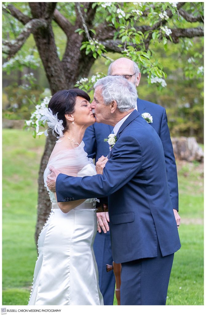 bride and groom's first kiss