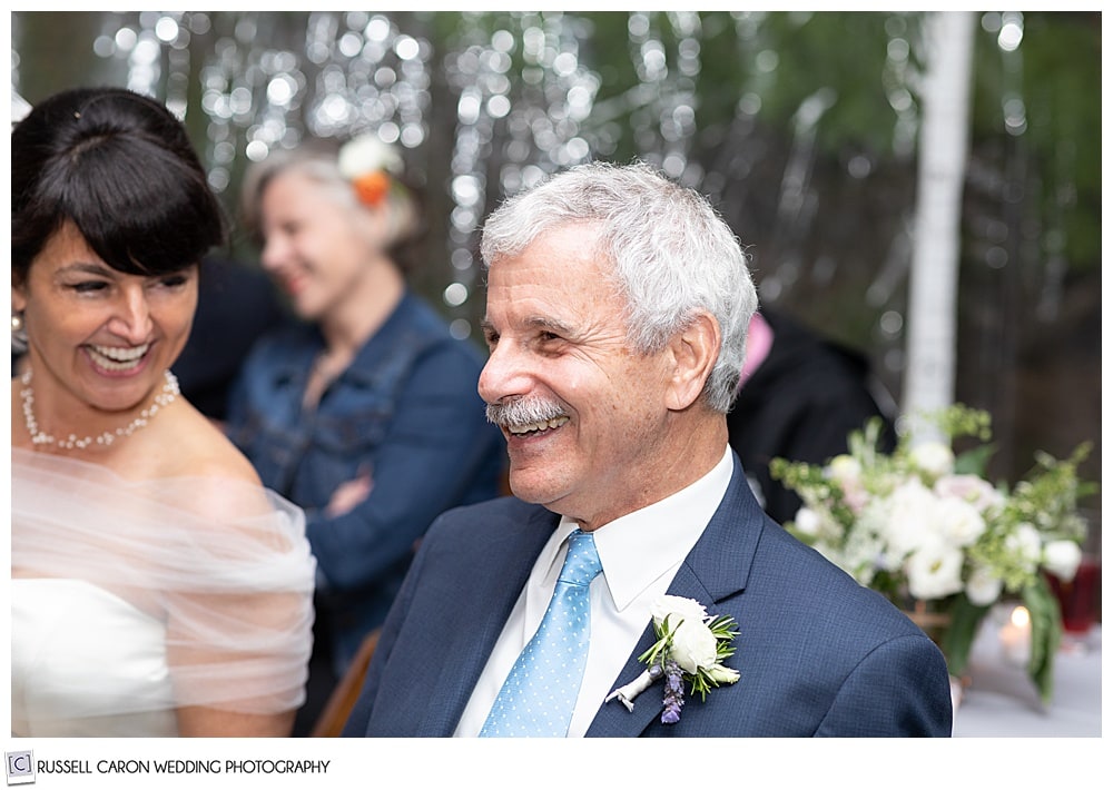 bride and groom smiling