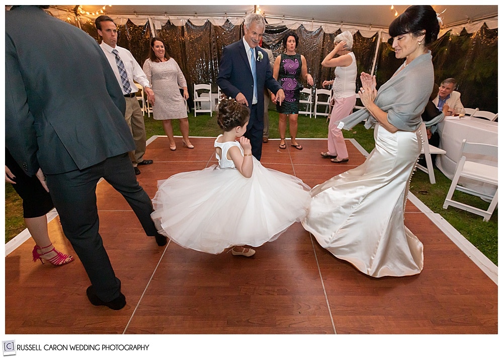 flower girl twirling on the dance floor