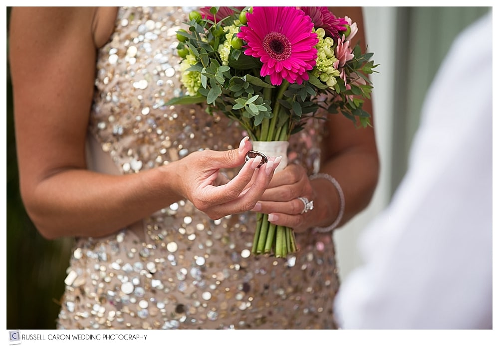 bride-holding-wedding-ring