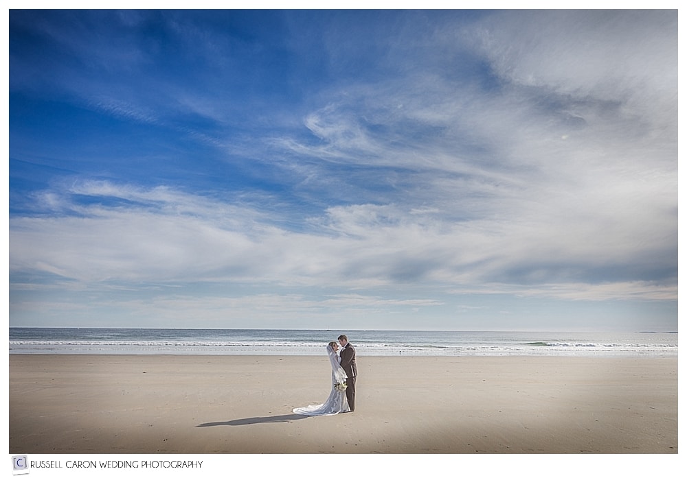 bride and groom on Gooches Beach Kennebunk Maine