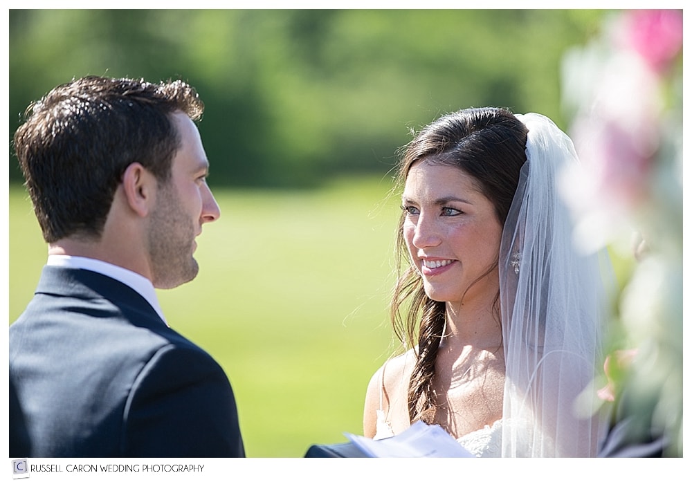 bride-looking-at-groom-during-wedding-vows