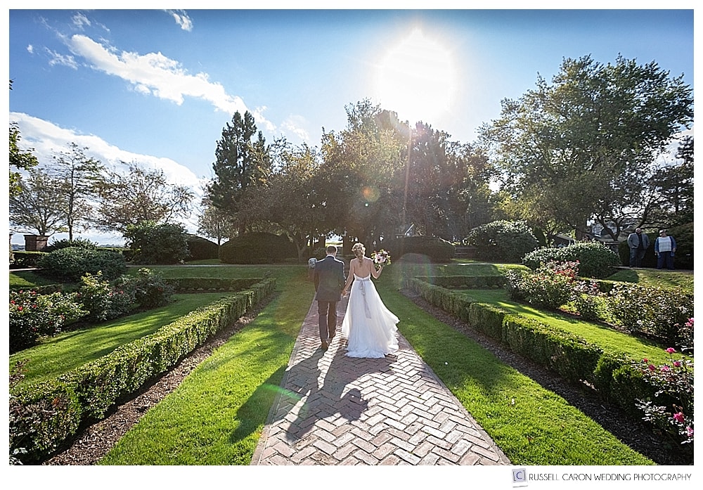 bride and groom walk away during their recessional at Lynch Park wedding, Beverly, MA