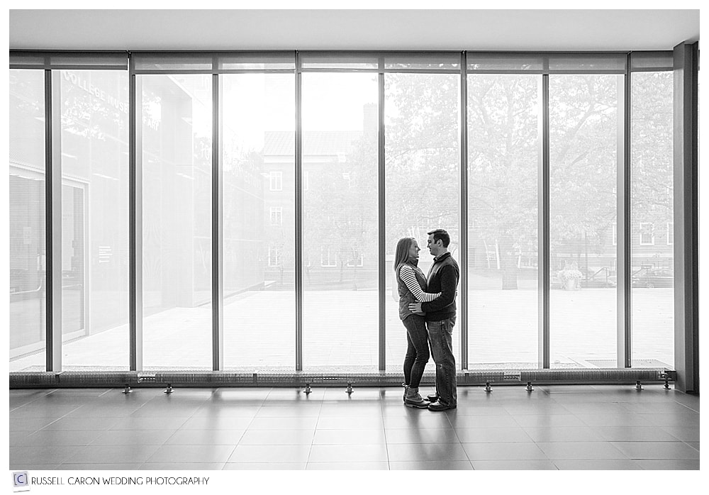 engaged couple standing together in Colby College Museum of Art, Waterville, Maine
