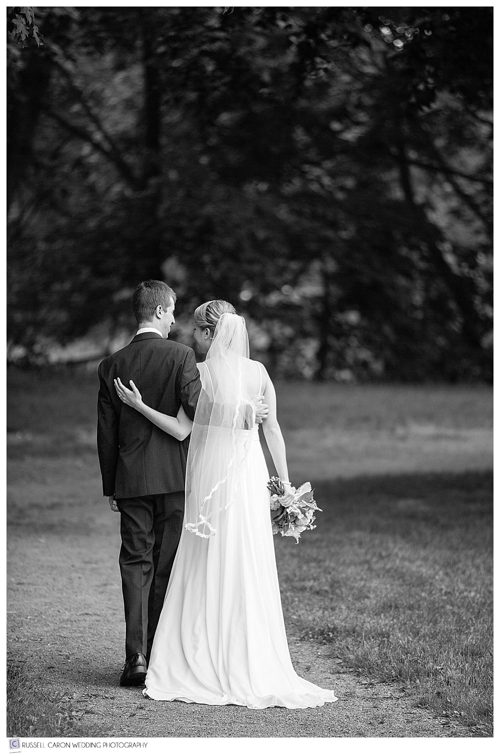 bride-and-groom-walking-in-mill-creek-park-south-portland-maine