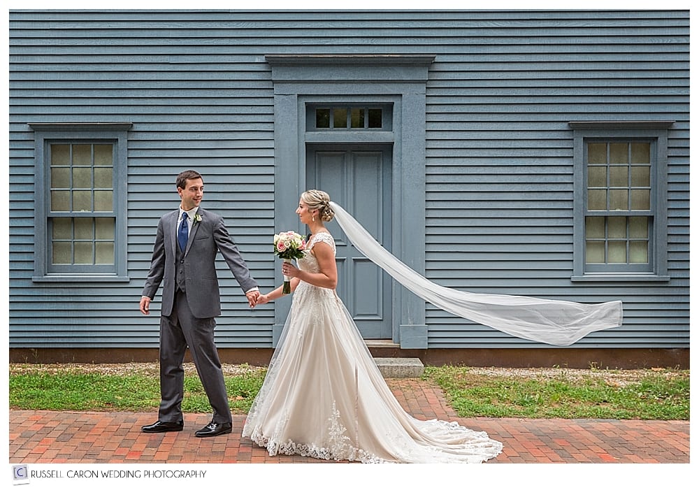 bride and groom walking in portsmouth new hampshire