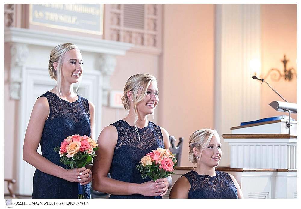 bridesmaids during wedding ceremony at south church portsmouth new hampshire