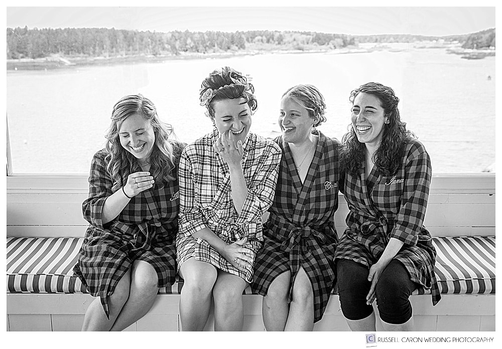bride and bridesmaids wearing plaid flannel robes