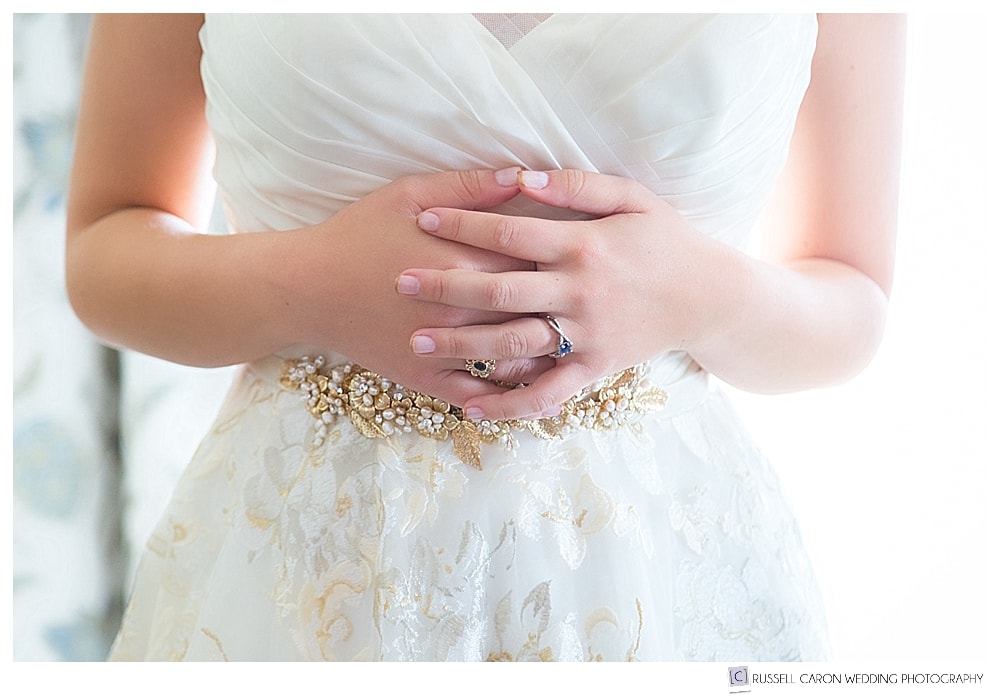 bride with hands clasped 