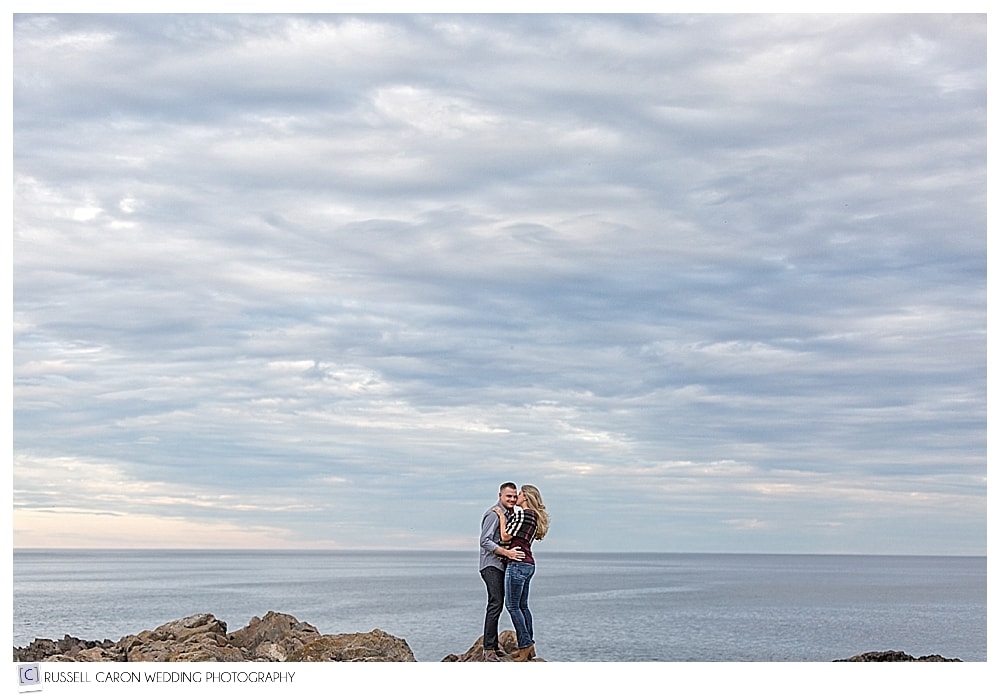 couple standing on the rocks on Marginal Way Ogunquit Maine