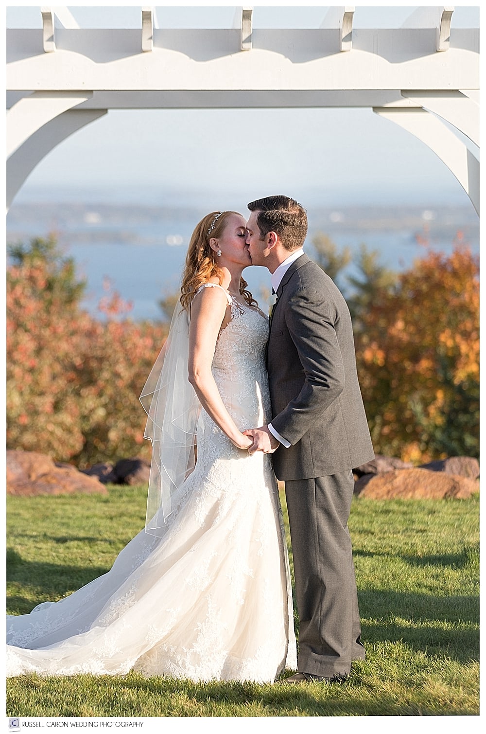 bride and groom during first kiss