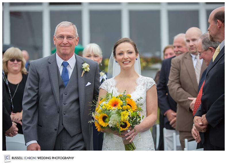 Bride and her father during outdoor wedding