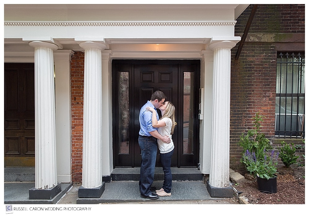 man-and-woman-kissing-during-beacon-hill-engagement
