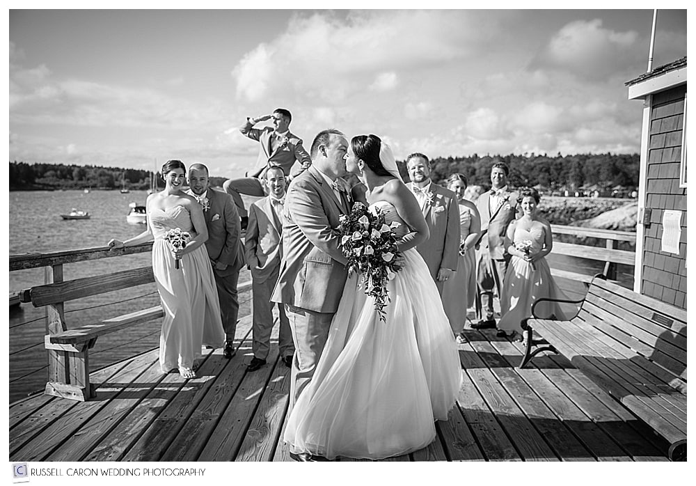 bridal party on dock at sebasco harbor resort