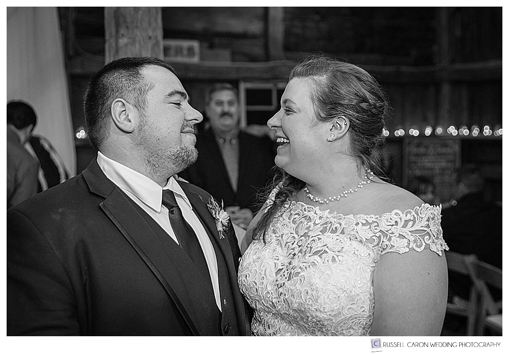 black and white photo of bride and groom during first dance