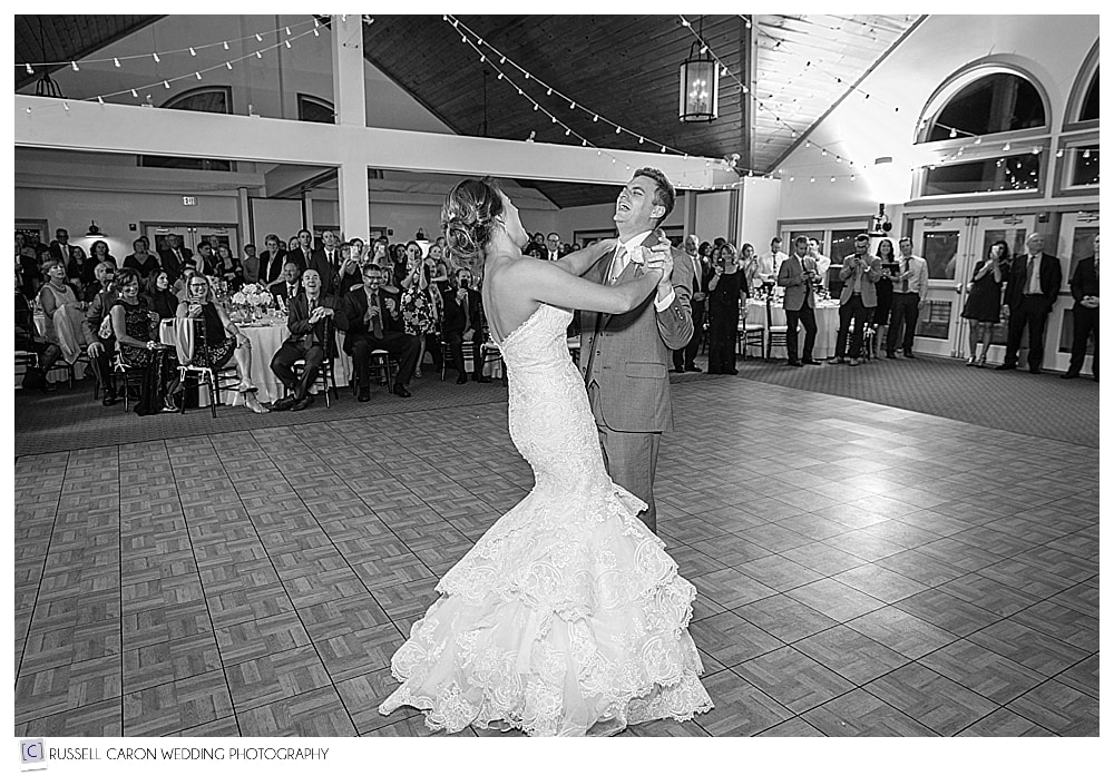 bride and groom laughing during first dance