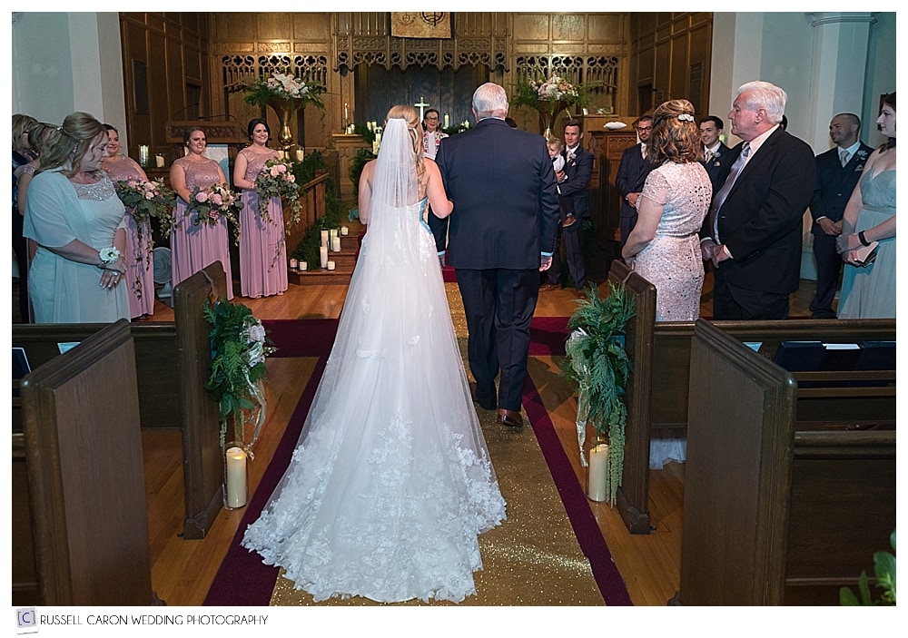 bride and step dad reach the altar