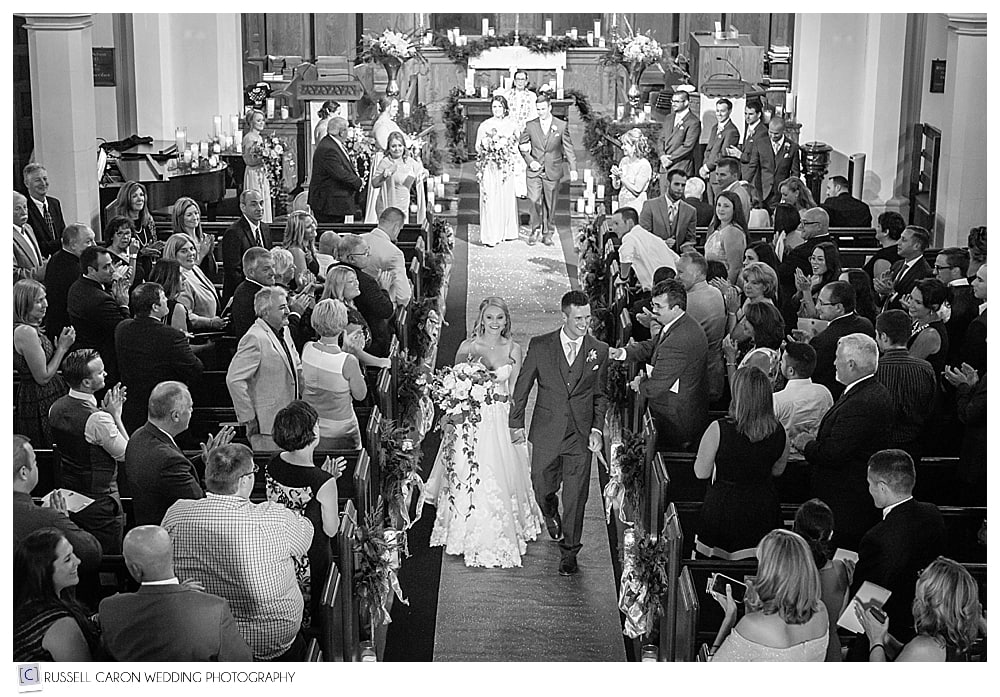 bride and groom during recessional at the Williston Immanual United Church