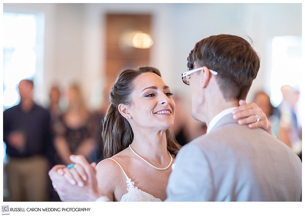 bride looking a t groom during their first dance