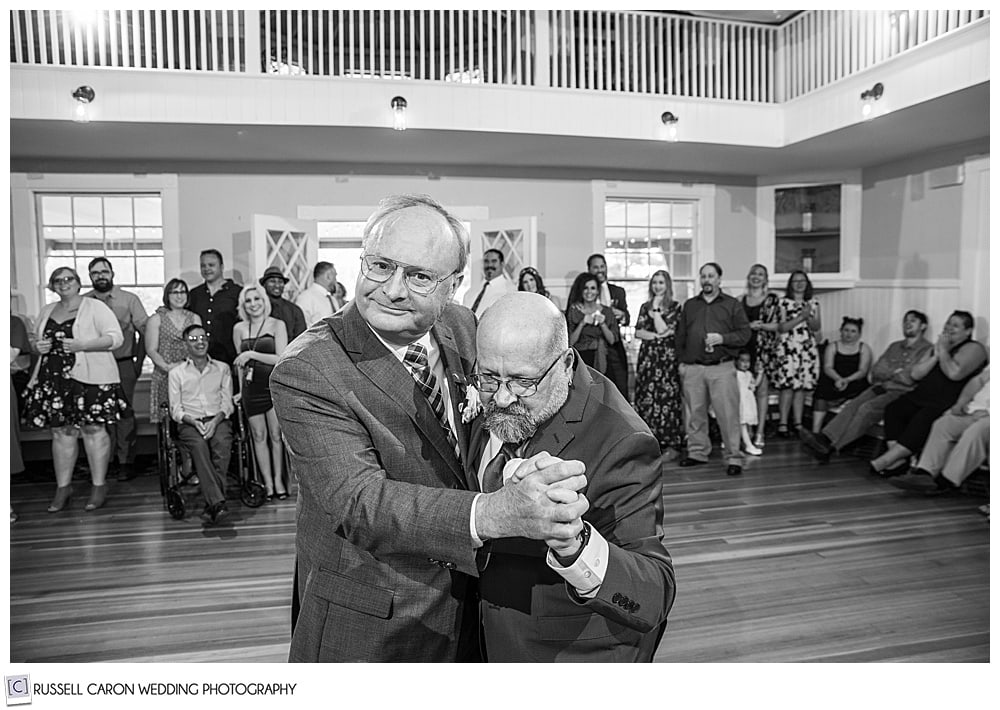 black and white photo of two men dancing