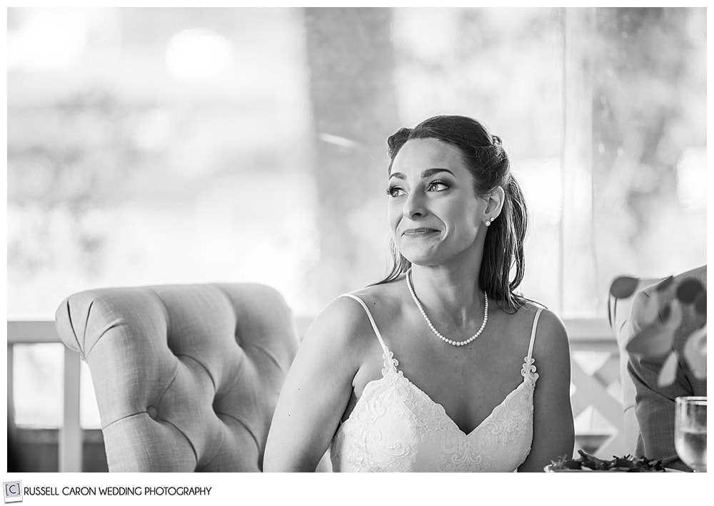 black and white photo of bride smiling