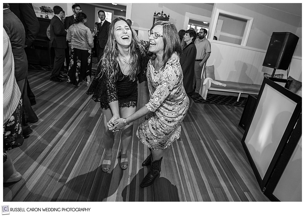 black and white photo of two women dancing