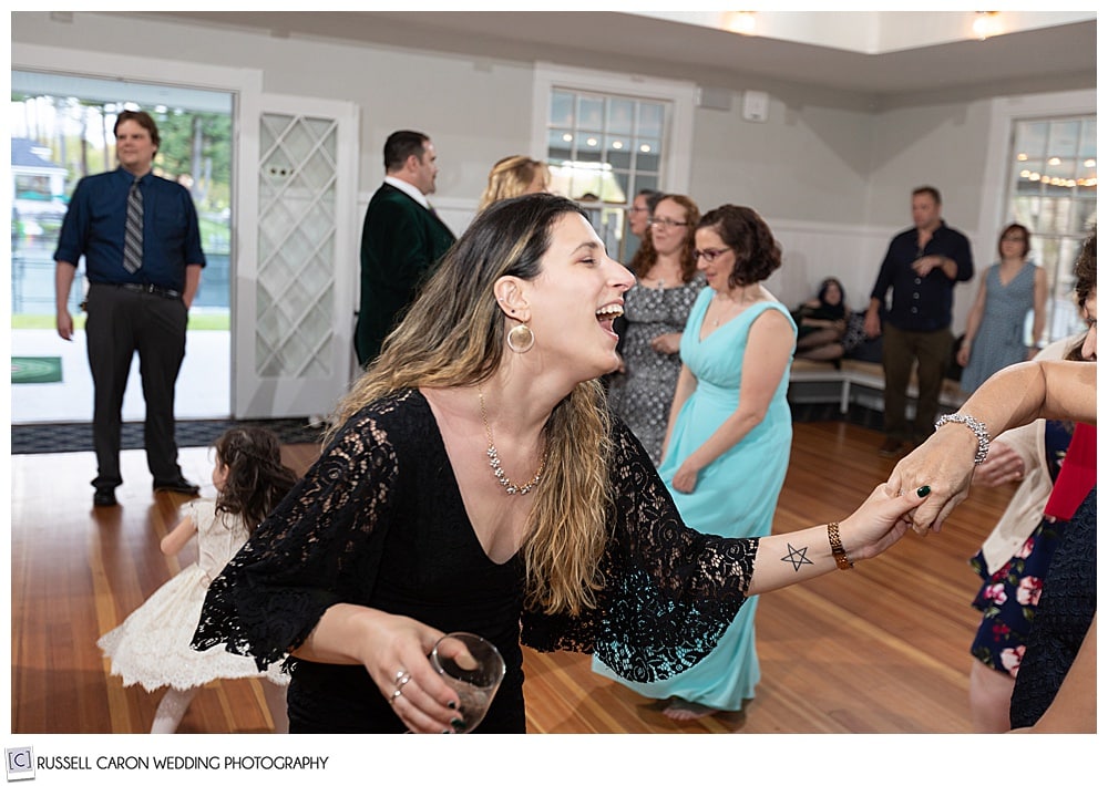 woman dancing and laughing