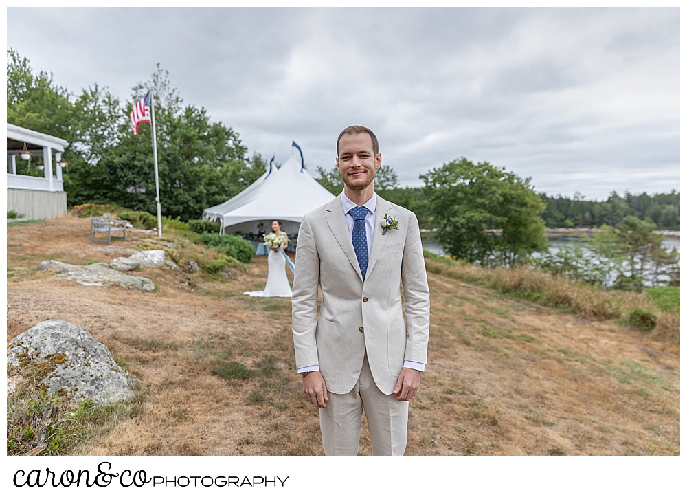 groom with his back turned, waiting for the wedding day first look at Grey Havens Inn wedding, Georgetown Maine