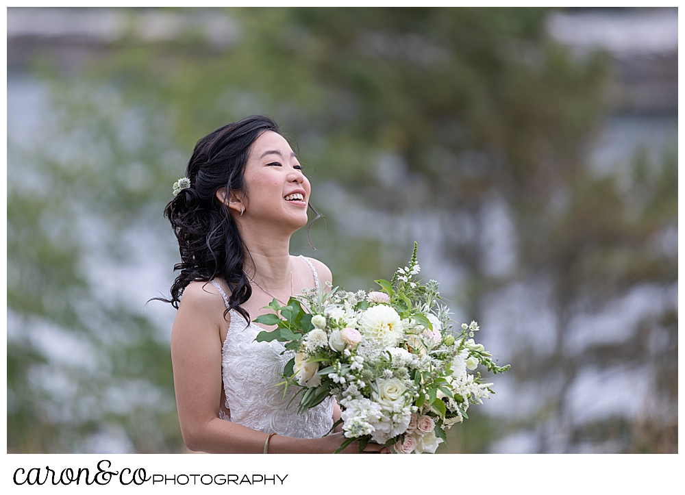 smiling bride during wedding day first look at Grey Havens Inn wedding, Georgetown Maine