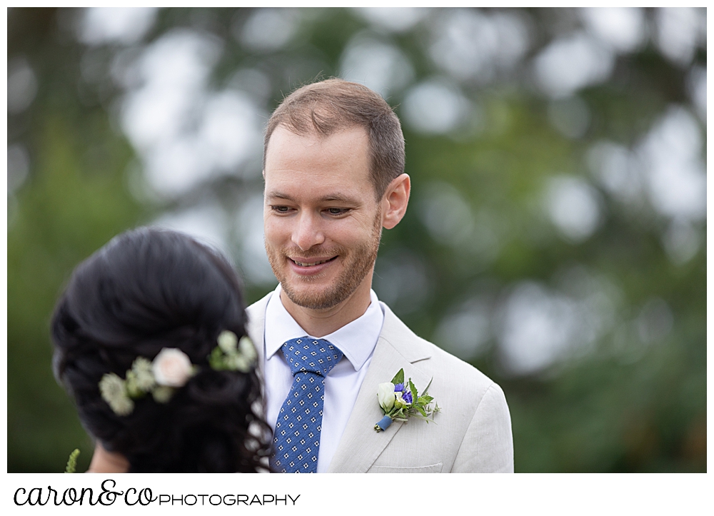 groom and bride during wedding day first look at Grey Havens Inn wedding, Georgetown Maine