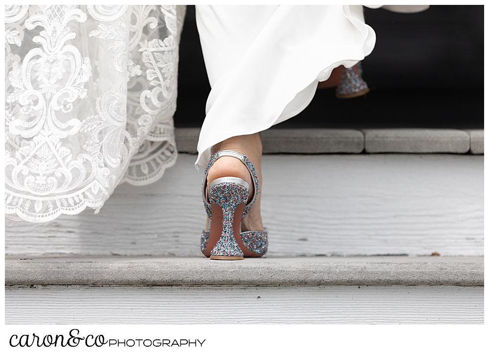 bride walking up the stairs, her lace train and sparkly shoes show on the stairs, Grey havens Inn wedding, Maine