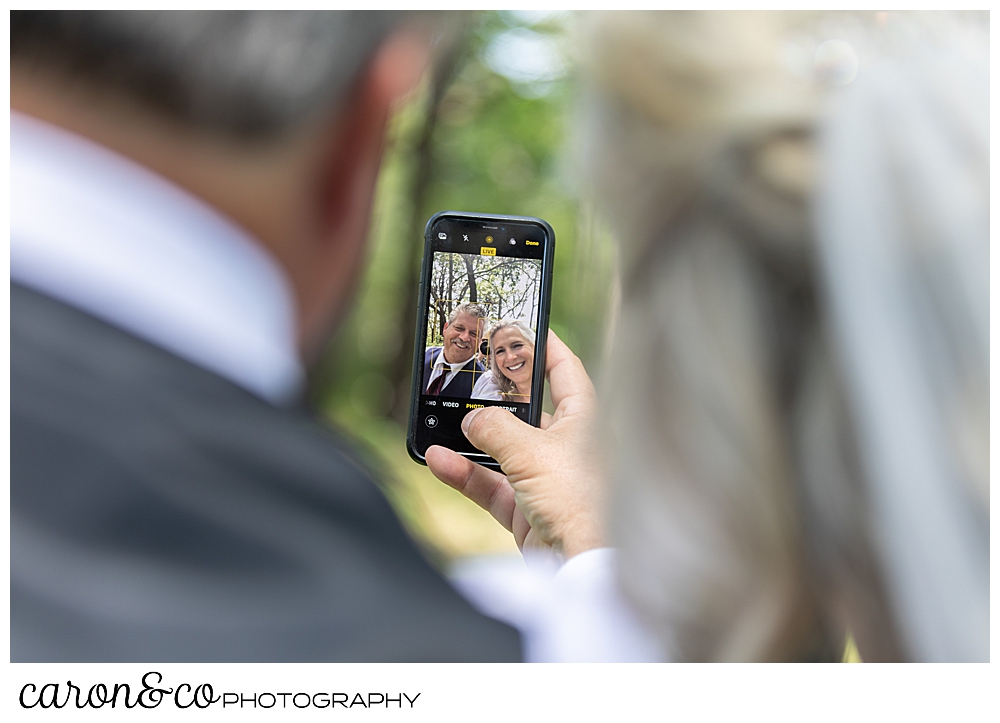 bride and groom take a selfie