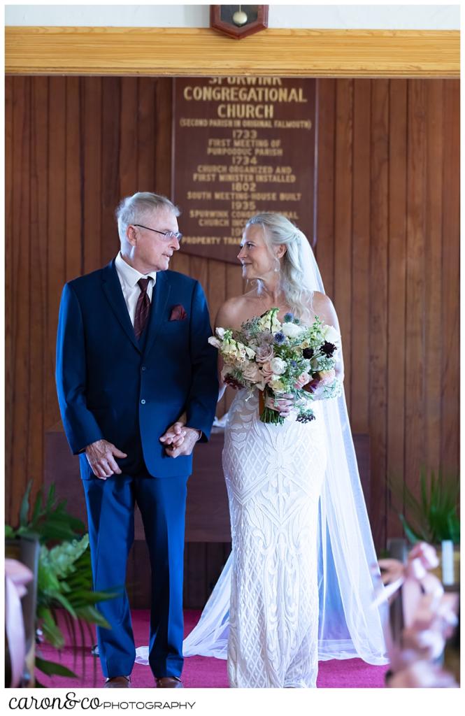 bride and her father standing in the back of the Spurwink Church, Cape Elizabeth, Maine before the recessional