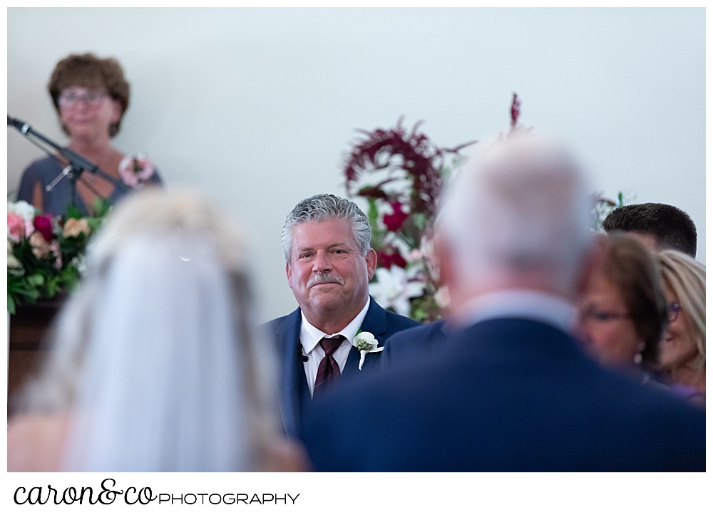 groom seeing his bride approach during their spurwink church cape elizabeth maine wedding ceremony