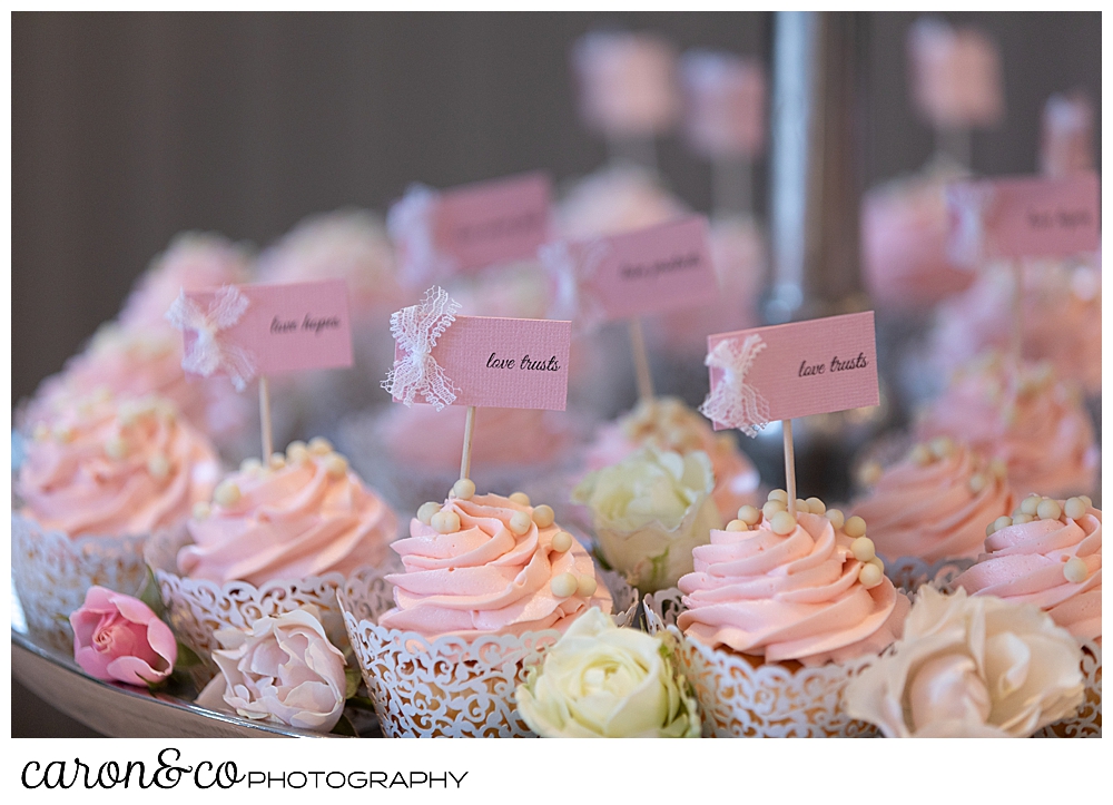 pink and white cupcakes at a scarborough maine wedding reception