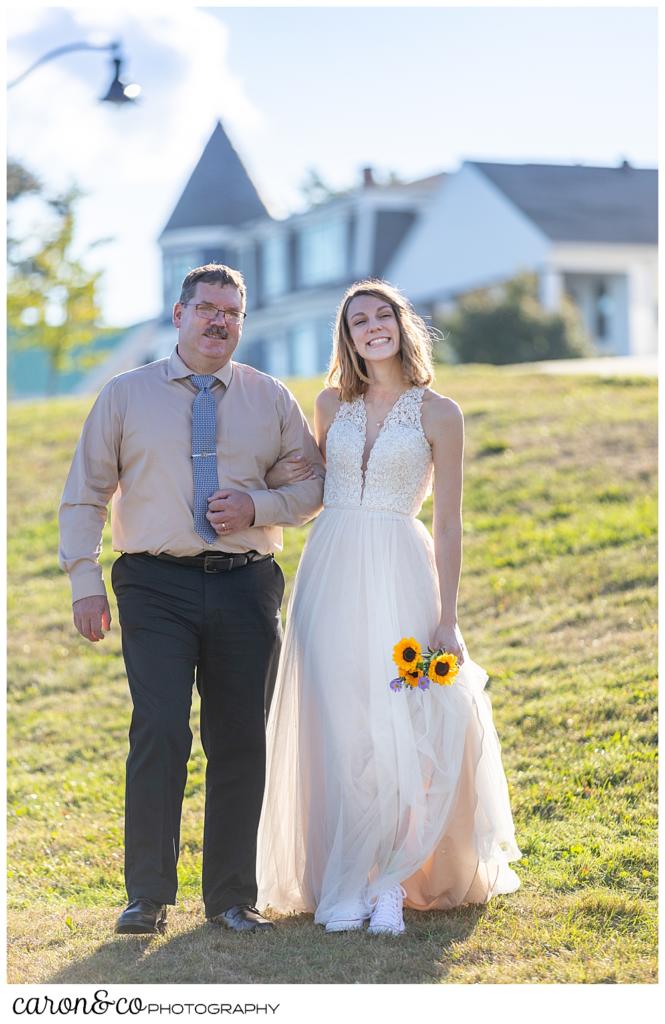 Bride and her father walking toward the sweet Portland Maine elopement site