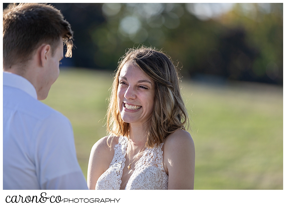 bride smiles at her groom during their sweet Portland Maine elopement