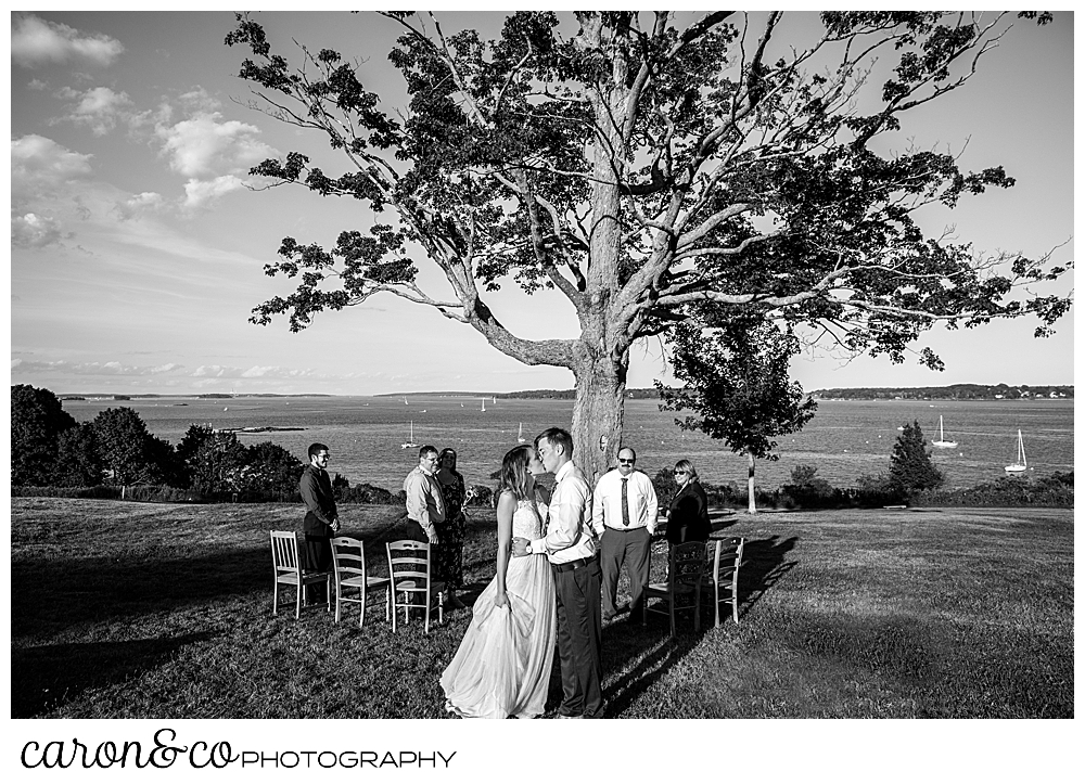 black and white photo of a bride and groom kissing after their sweet Portland Maine elopement ceremony in Fort Allen Park