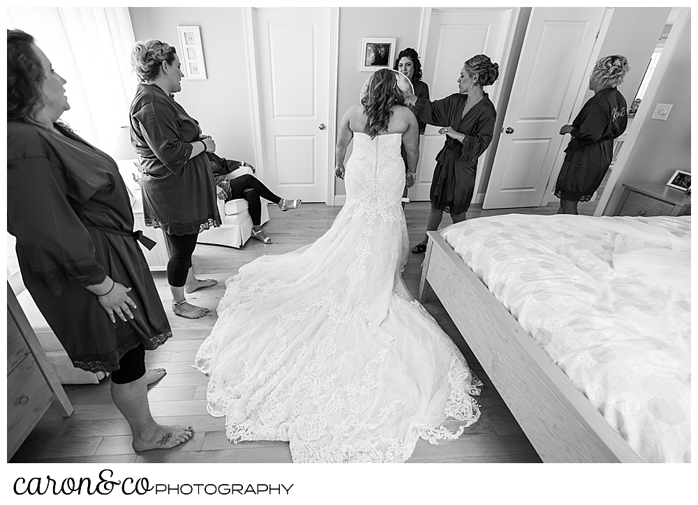 black and white photo of a bride getting ready for her wedding day