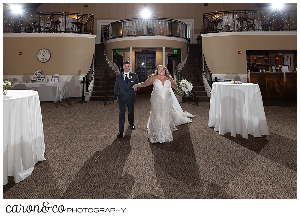 a bride and groom are announced in to their wedding reception at the Landing at Pine Point, Scarborough, Maine