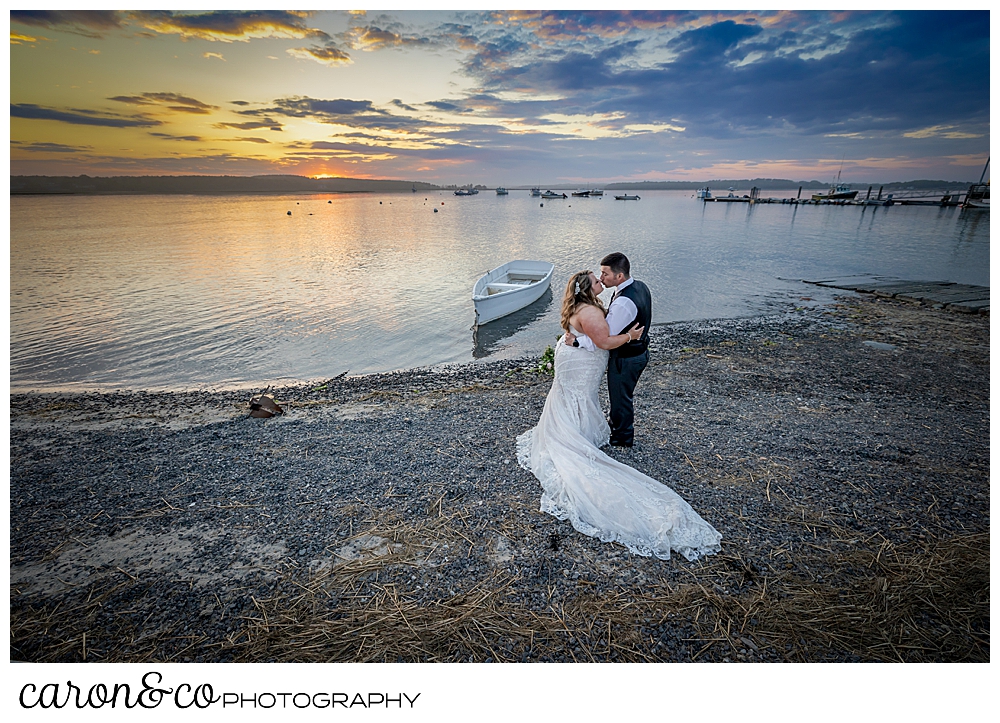 a bride and groom on the beach at Pine Point, Scarborough, Maine, during a beautiful sunset