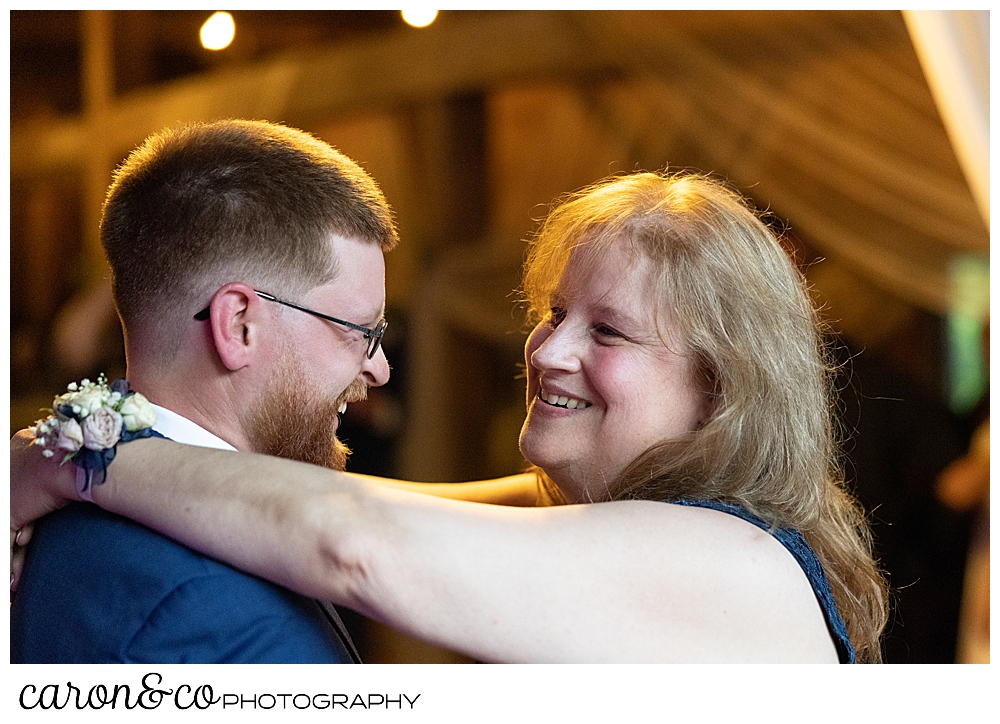 groom dancing with his mother at a highland lake maine wedding reception