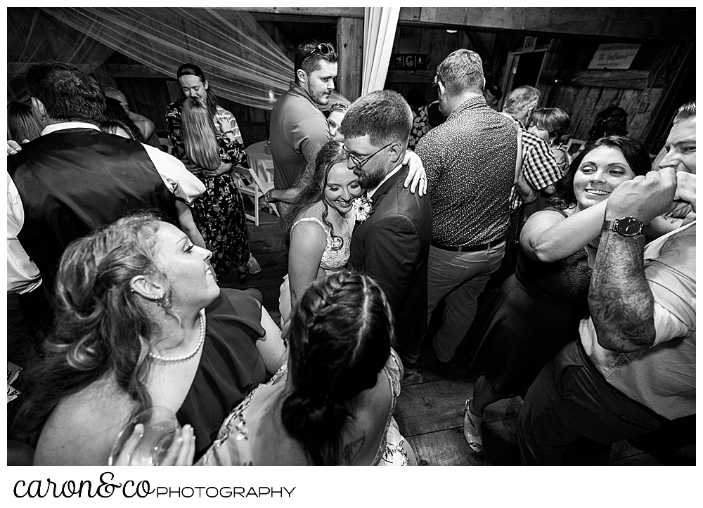 black and white photo of a bride and groom dancing during their Memory Lane Event Center, Harrison, Maine reception