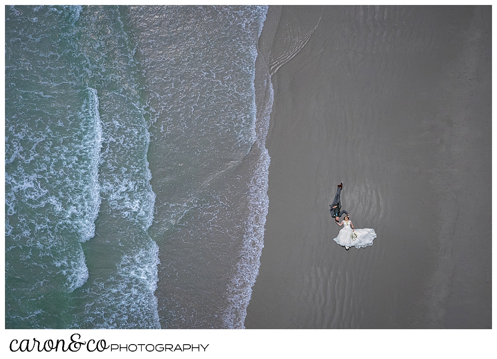 maine drone wedding photo of a bride and groom on the edge of Gooch's Beach, Kennebunk, Maine