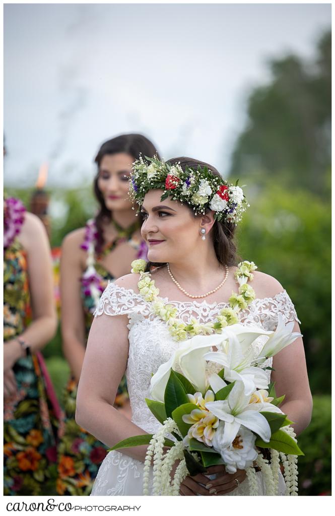 a bride standing at the outdoor ceremony site at the Nonantum Resort, Kennebunkport, Maine